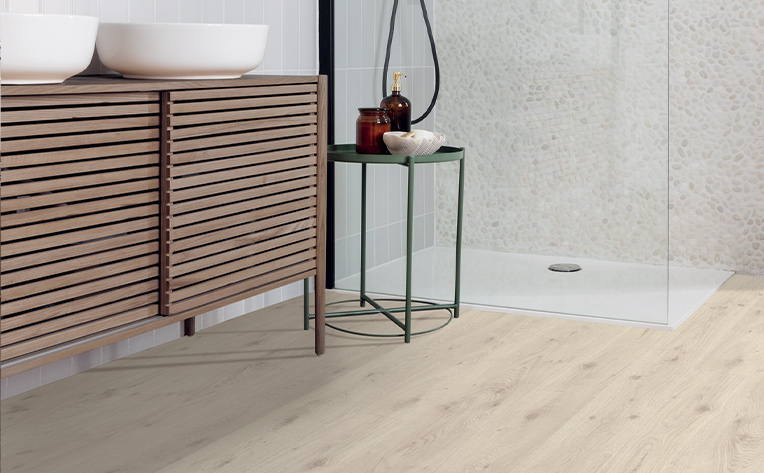 canadian shower floor with green side table